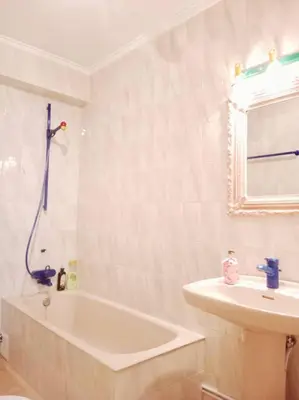 a white bathroom with a tub and a sink at Pastor Diaz Home in Viveiro