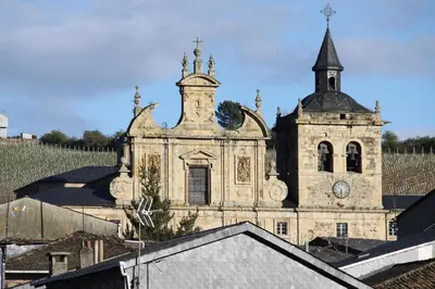 an old building with a clock tower on a roof at Venecia Bed&Breakfast in Villafranca del Bierzo
