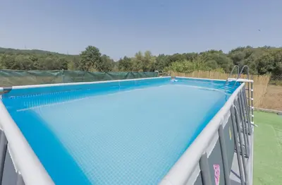a bunch of pictures hanging on a wall at Casa Luna Rural Con Piscina y Jardín in Ourense