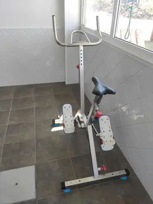 a gym with a exercise bike in a room at Casa da Pinguela Camino Inglés in Ordes