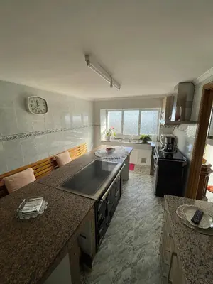 a kitchen with a stove and a counter top at A Casa da Torre Peruscallo in Belante