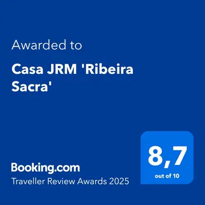 a screenshot of a cell phone with the text awarded to casa jim r at Casa JRM 'Ribeira Sacra' in Monforte de Lemos