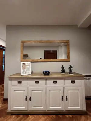 a large white cabinet with a mirror on the wall at Apartamento Villaluz in Monforte de Lemos