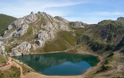 an aerial view of a mountain with a lake at Apartamentos Rurales Casa Marcelo in Veigas