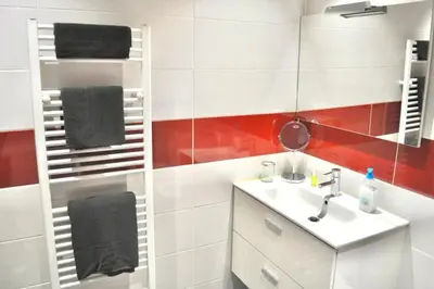 a bathroom with a sink and a mirror at Curros Enríquez RD, Céntrico, PLAZA GARAGE in Ourense
