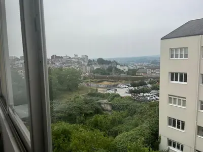 a view of a city from a window at Apartamento DENTRO DE MURALLA y PARKING GRATUITO en pleno centro in Lugo