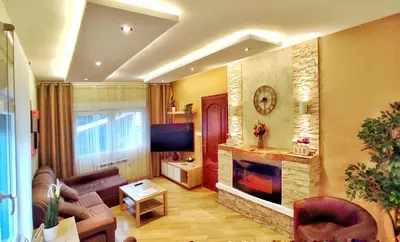 a living room with a couch and a fireplace at Casa en Cortiñan in Bergondo