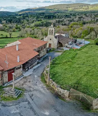 an aerial view of a village with a church at Casa-Museo Genia Trigo in Sober
