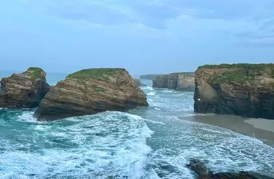 an aerial view of the ocean with rocks at Apartamento de Begoña in Barreiros