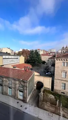 a view of a city street with buildings at Apartamentos San Martin Ourense Centro 2 in Ourense