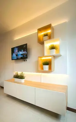 a living room with a tv on a wall at Apartamento completo con wifi en Betanzos in Betanzos