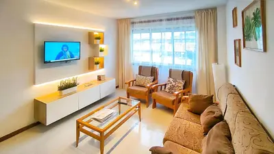 a living room with a couch and a tv at Apartamento completo con wifi en Betanzos in Betanzos
