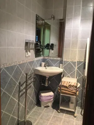 a bathroom with a sink and a mirror at Tía María in Cerredo