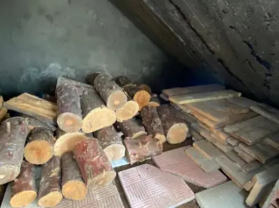 a pile of wood and other materials on a table at Casa Vilachá - Ribeira Sacra in Puebla del Brollón