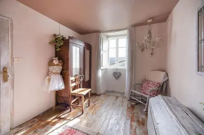 a room with a table and a chair and a window at YourHouse A Casa Dos Cregos in Fonteita