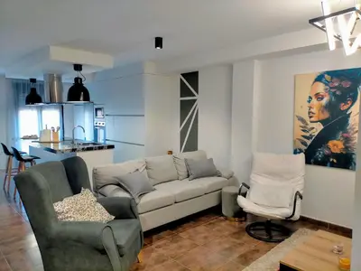 a living room with a couch and two chairs at Piso turistico el Sol VUT-983 in Astorga