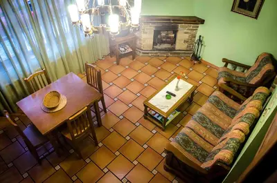 an overhead view of a living room with a table and a couch at Casas Rurales Taramundi Verde in Taramundi