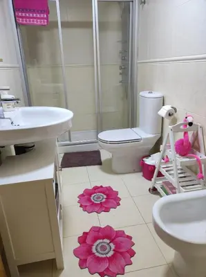 a bathroom with a toilet and a sink and a shower at Val de Lemos in Monforte de Lemos