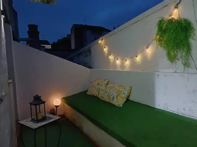 a bed on a wall with a lamp and lights at Val de Lemos in Monforte de Lemos