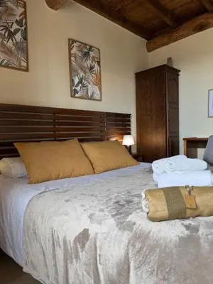 a bed with a bunch of hay on it at Venta Celta in O Cebreiro