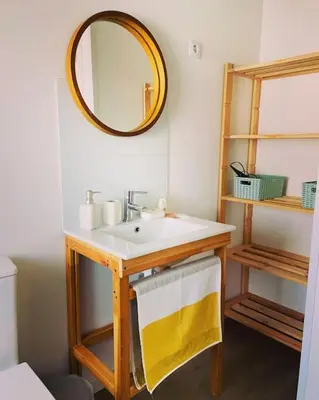 a bathroom with a sink and a mirror at Casa Vilar (Taboadela-Ourense) in Taboadela