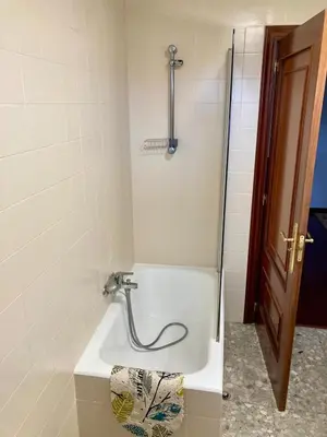a sink in a bathroom with a shower at A casa de Lago in Lago