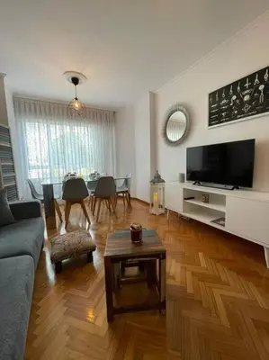 a living room with a couch and a table at Appartement vistahermosa in Vivero