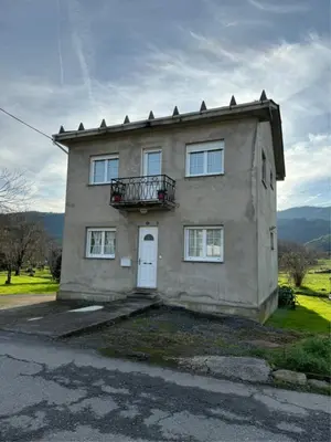 a small house with a balcony on top of it at Casa Manuel in Vivero