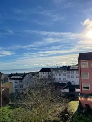 a view of a city with buildings in the background at APARTAMENTO NUEVO EN BURELA - A Mariña, Galicia in Burela de Cabo