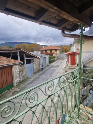 a view of a street from a balcony at A casa d'abaixo in Parada del Sil