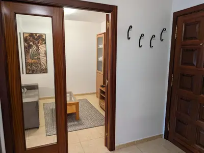 a door leading into a room with a closet at Don Manuel Cuntis in Cuntis