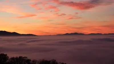 a view from above the clouds at sunset at Hotel Rural La Casa del Peregrino in El Acebo de San Miguel