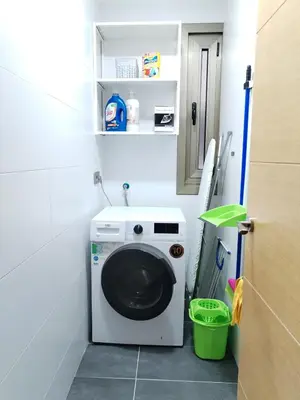a laundry room with a washing machine in it at Viveiro Bahía in Viveiro