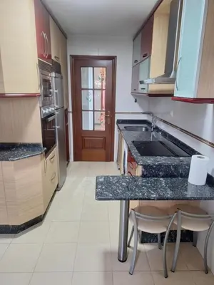 a kitchen with a sink and a counter top at Jardines in O Barco de Valdeorras