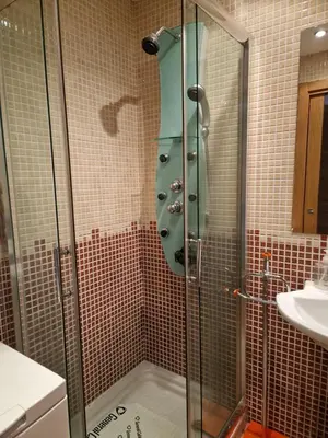 a shower with a glass door in a bathroom at Alojamiento en Ares a 2 minutos de la playa in Ares