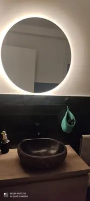 a bathroom with a large tire sink on a counter at Doctor Gasalla in Lugo