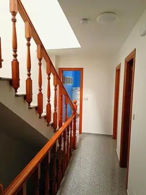 a hallway with stairs in a house at O Soño de Santiago - Casa rural Mondoñedo, Galicia in Mondoñedo