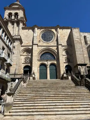 a large building with stairs in front of a building at LAS TERRAZAS II Apartamento de lujo frente a la Catedral in Ourense