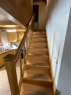 a staircase in a house with wooden floors at CASA GUIMARAS in Cortes