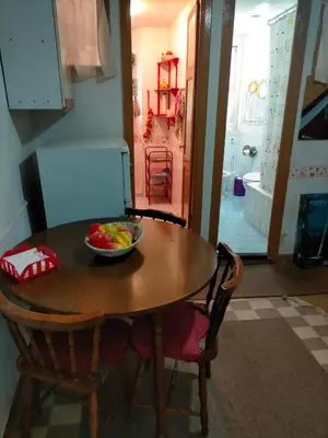 a bowl of fruit on a table in a kitchen at Apartamento Casco Viejo in Ourense