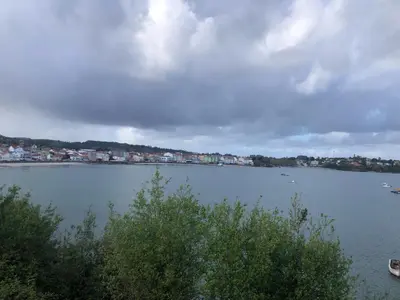 a view of a large body of water with houses at Apartamentos Ares Rentals in Ares