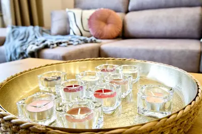 a tray filled with glasses of wine on a table at Lucus Skyline & Terrace by Lugo Collection in Lugo