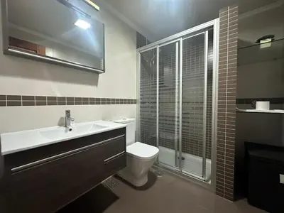 a room with two beds in a room at HOME GV35 By Oktheway in Sarria