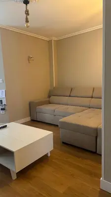 a living room with a couch and a coffee table at Apartamento Santiago in Santiago de Compostela