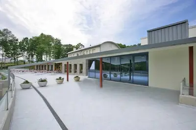 a large building with a lot of windows on it at Hotel Parrilla el Zangano in Boal
