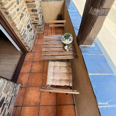 an overhead view of a bench and a potted plant at A Barreira in Ferrol