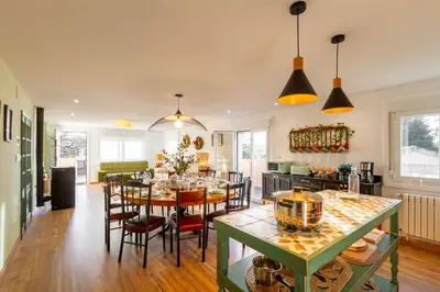a dining room with a table and chairs at A Casa da Carminha, Ribeira Sacra in Pereiro de Aguiar