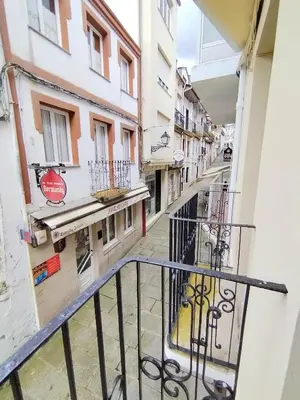 a view of an alley from a balcony of a building at Steve Apartamento in Viveiro