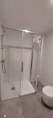 a bathroom with a shower and a toilet at Temple I in Ponferrada