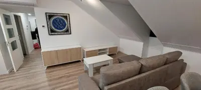 a living room with a couch and a table at Temple I in Ponferrada